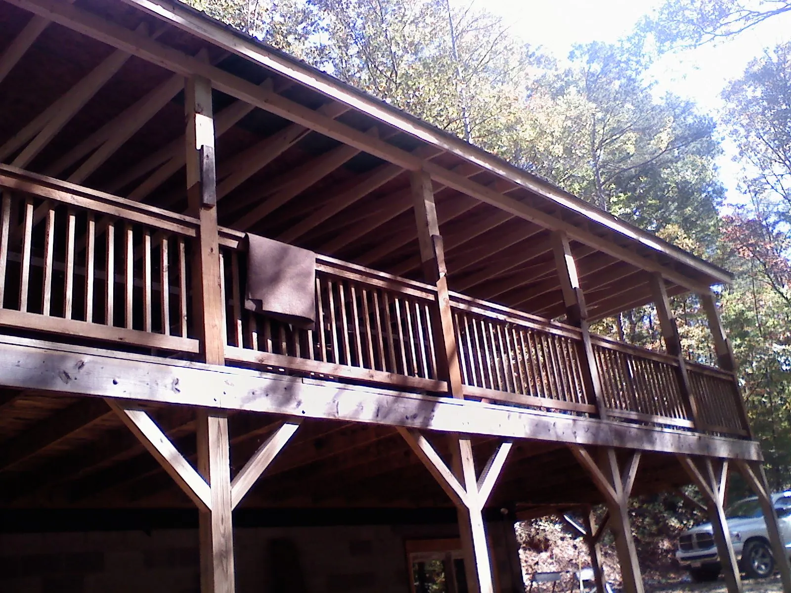 Timber framing under a new elevated porch and deck — Roof Leak Repair in Saint Edward by Roofing Brothers